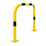 A fixed yellow barrier with black and yellow stripes.