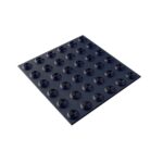 A Double Sided Dotted Top mat with a lot of holes on it.