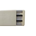 A beige plastic box with two handles on it.